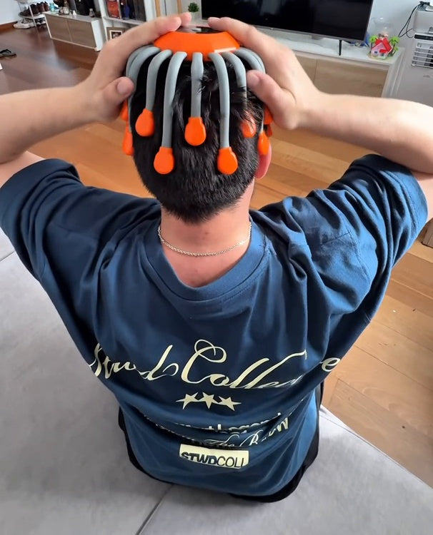 Electric Scalp Massager worn on head